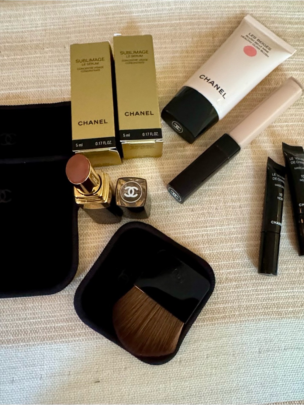 CHANEL Black Cosmetic Pouch with Gold Logo and Assorted Makeup - Picture 2 of 6